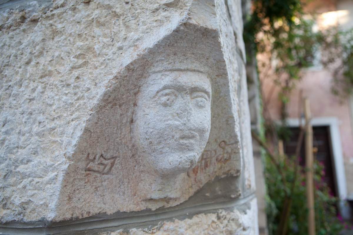 A stone mascaron in Dobrinj